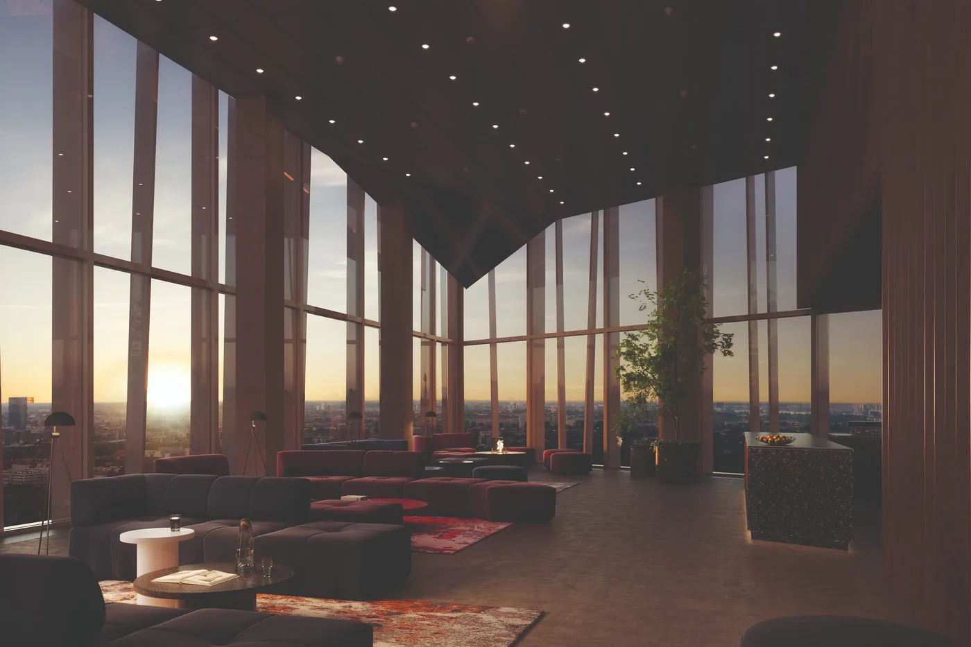 Private dining on the Sky Floors as the sun sets over Berlin